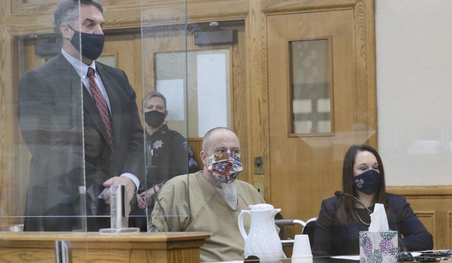 Defense attorney James Archibald addresses Judge Joel Tingey during the plea hearing of Brian Dripps at the Bonneville County Courthouse on Tuesday, Feb. 9, 2021 in Idaho Falls, Idaho. Dripps plead guilty to the rape and murder of Angie Dodge in 1996. (John Roark/The Idaho Post-Register via AP, Pool)