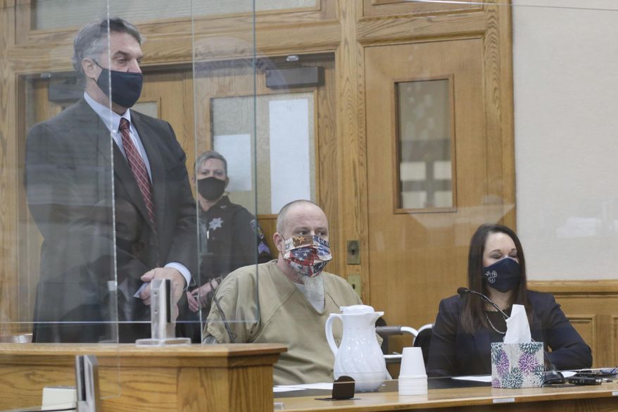 Defense attorney James Archibald addresses Judge Joel Tingey during the plea hearing of Brian Dripps at the Bonneville County Courthouse on Tuesday, Feb. 9, 2021 in Idaho Falls, Idaho. Dripps plead guilty to the rape and murder of Angie Dodge in 1996. (John Roark/The Idaho Post-Register via AP, Pool)