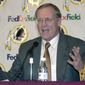 In this Jan. 4, 2001, file photo, Washington Redskin&#x27;s new head coach Marty Schottenheimer speaks at a news conference at Redskins Park in Ashburn, Va. Marty Schottenheimer, who won 200 regular-season games with four NFL teams thanks to his “Martyball” brand of smash-mouth football but regularly fell short in the playoffs, has died. He was 77.Schottenheimer died Monday night, Feb. 8, 2021,  at a hospice in Charlotte, North Carolina, his family said through Bob Moore, former Kansas City Chiefs publicist. (AP Photo/Stephen J. Boitano, FIle) **FILE**