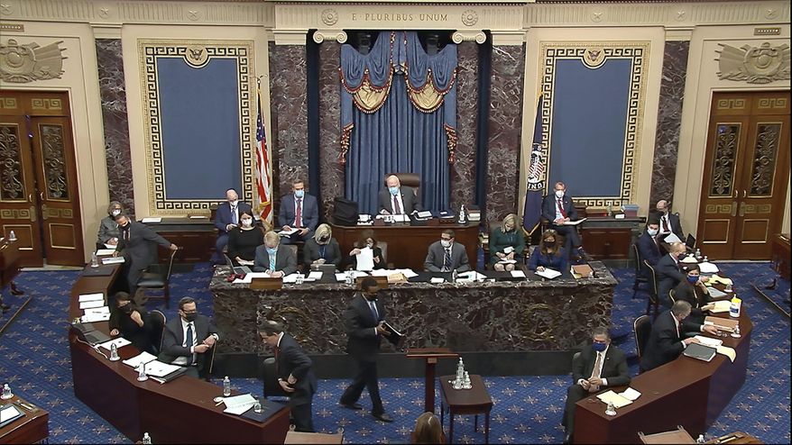 In this image from video, House impeachment manager Rep. Joe Neguse, D-Colo., prepares to speak during the second impeachment trial of former President Donald Trump in the Senate at the U.S. Capitol in Washington, Tuesday, Feb. 9, 2021. (Senate Television via AP)