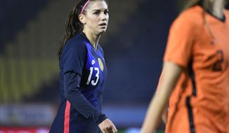 FILE - In this Nov. 27, 2020, file photo, United States Alex Morgan reacts during the international friendly women&#x27;s soccer match agaiinst The Netherlands at Rat Verlegh stadium in Breda, southern Netherlands. Morgan is back with the U.S. national team and learning to adjust to a career as a working mom. (Piroschka van de Wouw/Pool via AP, File)