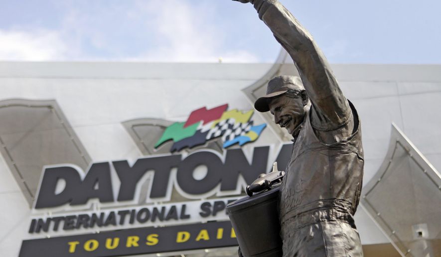 FILE - In this Feb. 16, 2011, file photo, a statue of Dale Earnhardt rises above an entrance at Daytona International Speedway in Daytona Beach, Fla. On the cusp of a national popularity explosion, NASCAR never stopped after the deaths of Adam Petty, Kenny Irwin Jr. and Tony Roper. But losing Earnhardt forced the stock car series to confront safety issues it had been slow to even acknowledge, let alone address. The dramatic upgrades have saved multiple lives — NASCAR has not suffered a racing death in its three national series since — and are the hallmark of Earnhardt&#39;s legacy. (AP Photo/Lynne Sladky, File)