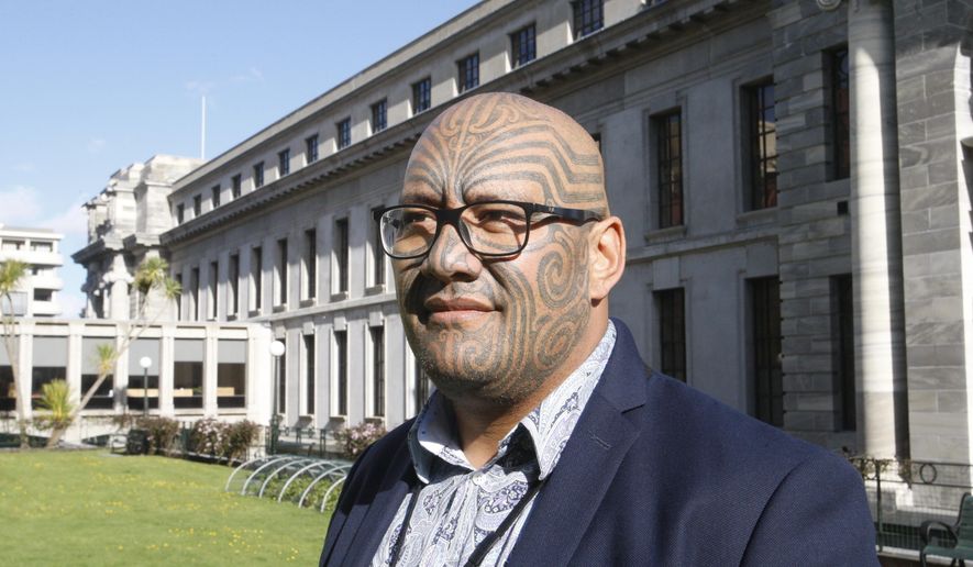 Maori Party co-leader Rawiri Waititi poses for a photo outside New Zealand's Parliament in Wellington in October 2020. Waititi this week won a battle against wearing a tie in the Parliament, ending a longstanding dress requirement that he describes as a "colonial noose." (AP Photo/Nick Perry)