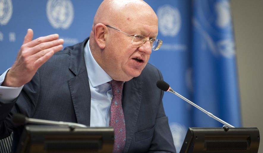 In this photo provided by the United Nations, Vassily Nebenzia, Permanent Representative of the Russian Federation and President of the Security Council for the month of October, briefs reporters on the work of the Security Council for the month, at the U.N., Thursday, Oct. 1, 2020, in New York. (Mark Garten/UN Photo via AP)