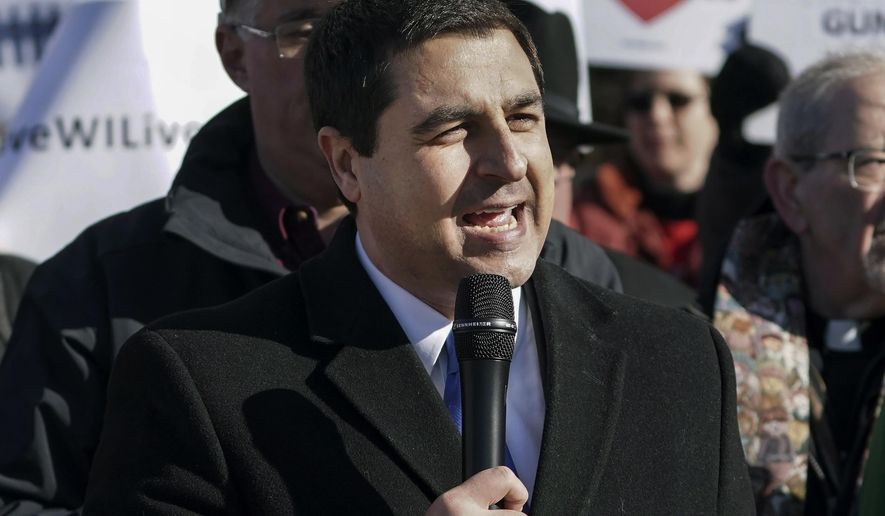 FILE - In this Nov. 7, 2019, file photo, Wisconsin Attorney General Josh Kaul speaks at the State Capitol in Madison, Wis. A broad coalition of Wisconsin law enforcement agencies, health care professionals, local governments and others on Thursday, Feb. 11, 2021, recommended bolstering regional services as part of a multi-faceted approach to better handling emergency mental health detentions. Attorney General Josh Kaul convened a summit to study the problem in 2019. (Steve Apps/Wisconsin State Journal via AP, file)