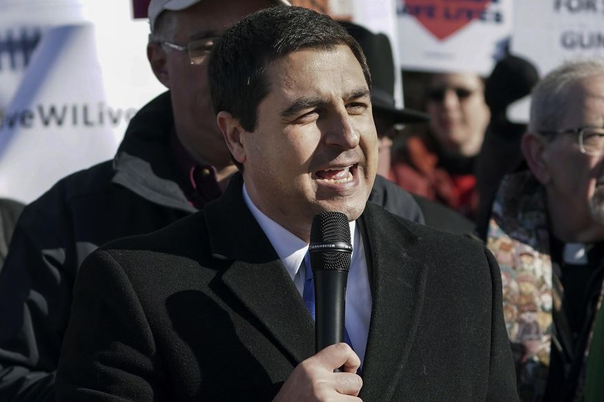 FILE - In this Nov. 7, 2019, file photo, Wisconsin Attorney General Josh Kaul speaks at the State Capitol in Madison, Wis. A broad coalition of Wisconsin law enforcement agencies, health care professionals, local governments and others on Thursday, Feb. 11, 2021, recommended bolstering regional services as part of a multi-faceted approach to better handling emergency mental health detentions. Attorney General Josh Kaul convened a summit to study the problem in 2019. (Steve Apps/Wisconsin State Journal via AP, file)