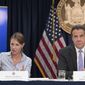 FILE — In this Sept. 14, 2018 file photo, Secretary to the Governor Melissa DeRosa, is joined by New York Gov. Andrew Cuomo as she speaks to reporters during a news conference, in New York. De Rosa, Cuomo&#x27;s top aide, told top Democrats frustrated with the administration&#x27;s long-delayed release of data about nursing home deaths that the administration &amp;quot;froze&amp;quot; over worries about what information was &amp;quot;going to be used against us,&amp;quot; according to a Democratic lawmaker who attended the Wednesday, Feb. 10, 2021 meeting and a partial transcript provided by the governor&#x27;s office. (AP Photo/Mary Altaffer, File)