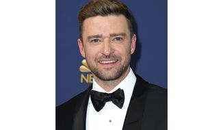 FILE - Justin Timberlake arrives at the 70th Primetime Emmy Awards in Los Angeles on Sept. 17, 2018. Timberlake says that he wants to apologize to Britney Spears and Janet Jackson “because I care for and respect these women and I know I failed.” Timberlake’s social media post comes a week after the release of “The New York Times Presents: Framing Britney,” the FX and Hulu documentary that takes a historical look at the circumstances that led Spears’ conservatorship in 2008 and highlights the #FreeBritney movement.  (Photo by Jordan Strauss/Invision/AP, File)