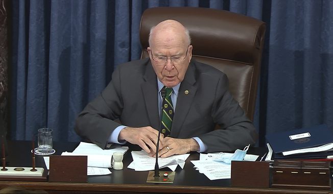 In this image from video, Sen. Patrick Leahy, D-Vt., the president pro tempore of the Senate, who is presiding over the second impeachment trial of former President Donald Trump, speaks before voting in the second impeachment trial of former President Donald Trump in the Senate at the U.S. Capitol in Washington, Saturday, Feb. 13, 2021. (Senate Television via AP)