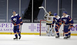 New York Islanders right wing Jordan Eberle (7) skates to the bench after scoring a goal past Boston Bruins goaltender Tuukka Rask during the first period of an NHL hockey game Saturday, Feb. 13, 2021, in Uniondale, N.Y. (AP Photo/Adam Hunger)