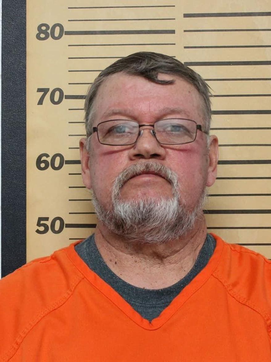 This photo provided by Emmet County Sheriffs Office shows Greg Buum. The Emmett County Sheriff’s Office announced Friday, Feb. 12, 2021, in a news release posted on Facebook that the Iowa Attorney General’s Office filed the charges against Armstrong Mayor Greg Buum, police chief Craig Merrill, city clerk Tracie Lang and former city clerk Connie Thackery on Thursday. The sheriff’s office said the investigation uncovered “misappropriation of city funds, the presentation of fraudulent public records, deploying a TASER against a civilian in exchange for cash, and falsification of ledgers to conceal embezzlement.” (Emmet County Sheriffs Office via AP)