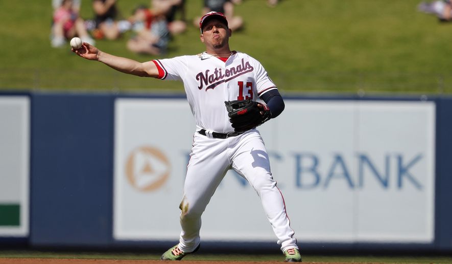 File-This March 2, 2020, file photo shows Washington Nationals third baseman Asdrubal Cabrera throws to first during the fourth inning of a spring training baseball game against the Miami Marlins in West Palm Beach, Fla. The Arizona Diamondbacks have agreed to terms on a $1.75 million, one-year deal with veteran infielder Cabrera, according to a person with knowledge of the negotiations. The agreement was reached on Friday, Feb. 12, 2021, and confirmed by The Associated Press on condition of anonymity because the deal is pending the completion of a successful physical exam. (AP Photo/Jeff Roberson, File)