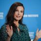 FILE - In this April 30, 2018, file photo, actress Ashley Judd speaks during a discussion on feminism at the Milken Institute Global Conference in Beverly Hills, Calif. Judd has recounted a painful ordeal that she believes almost cost her leg after tripping in a Congolese rainforest and having to be evacuated by motorbike. In one of two Instagram Live videos hosted Friday, Feb. 12, 2021, by New York Times columnist Nicholas Kristof, the actor said she was stuck on the ground for five hours with a “badly misshapen leg,” biting a stick because of pain, and “howling like a wild animal.” (AP Photo/Jae C. Hong, File)