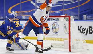 New York Islanders forward Anders Lee (27) celebrates his goal during the first period of an NHL hockey game against the Buffalo Sabres, Monday, Feb. 15, 2021, in Buffalo, N.Y. (AP Photo/Jeffrey T. Barnes)