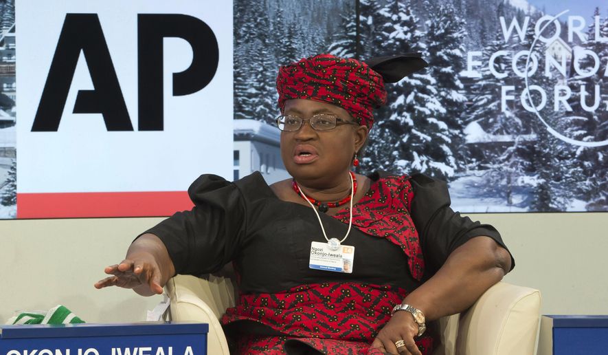 FILE - In this Friday, Jan. 24, 2014 file photo, Nigerian Finance Minister Ngozi Okonjo-Iweala during a panel discussion &amp;quot;The Post-2015 Goals: Inspiring a New Generation to Act&amp;quot;, the fifth annual Associated Press debate, at the World Economic Forum in Davos, Switzerland. Okonjo-Iweala was appointed Monday, Feb. 15, 2021 to head the World Trade Organization as it seeks to to resolve disagreements over how it decides cases involving billions in sales and thousands of jobs. Okonjo-Iweala was appointed as director-general of the leading international trade body by representatives of the 164 member countries, according to a statement from the body. (AP Photo/Michel Euler, file)