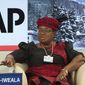 FILE - In this Friday, Jan. 24, 2014 file photo, Nigerian Finance Minister Ngozi Okonjo-Iweala during a panel discussion &amp;quot;The Post-2015 Goals: Inspiring a New Generation to Act&amp;quot;, the fifth annual Associated Press debate, at the World Economic Forum in Davos, Switzerland. Okonjo-Iweala was appointed Monday, Feb. 15, 2021 to head the World Trade Organization as it seeks to to resolve disagreements over how it decides cases involving billions in sales and thousands of jobs. Okonjo-Iweala was appointed as director-general of the leading international trade body by representatives of the 164 member countries, according to a statement from the body. (AP Photo/Michel Euler, file)