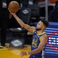 Golden State Warriors guard Stephen Curry (30) shoots against the Cleveland Cavaliers during the second half of an NBA basketball game in San Francisco, Monday, Feb. 15, 2021. (AP Photo/Jeff Chiu)