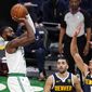 Boston Celtics guard Jaylen Brown, left, shoots over Denver Nuggets forward Michael Porter Jr. (1) and guard Facundo Campazzo, center, during the second half of an NBA basketball game, Tuesday, Feb. 16, 2021, in Boston. (AP Photo/Charles Krupa)