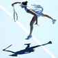 United States&#39; Jennifer Brady serves to compatriot Jessica Pegula during their quarterfinal match at the Australian Open tennis championship in Melbourne, Australia, Wednesday, Feb. 17, 2021.(AP Photo/Andy Brownbill)