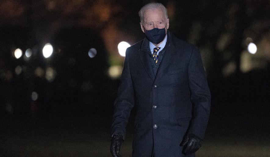 President Joe Biden walks on the South Lawn of the White House after stepping off Marine One, Wednesday, Feb. 17, 2021, in Washington. Biden was returning to Washington after participating in a town hall event in Wisconsin. (AP Photo/Patrick Semansky)