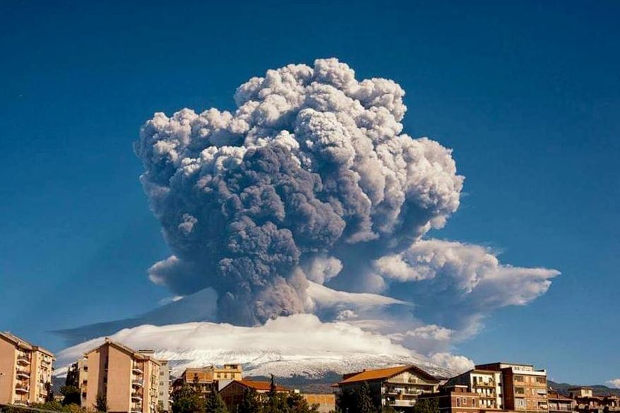 Smoke billows from Mount Etna, Europe’s most active volcano, Tuesday, Feb. 16, 2021. Mount Etna in Sicily, southern Italy, has roared back into spectacular volcanic action, sending up plumes of ash and spewing lava. (Davide Anastasi/LaPresse via AP)