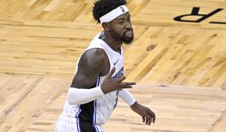 Orlando Magic guard Terrence Ross celebrates after scoring a 3-point basket during the second half of the team&#39;s NBA basketball game against the New York Knicks, Wednesday, Feb. 17, 2021, in Orlando, Fla. (AP Photo/Phelan M. Ebenhack)