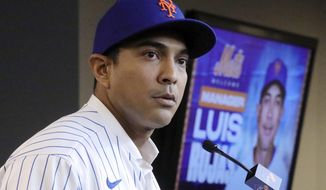 FILE - In this Jan. 24, 2020, file photo, New York Mets new manager Luis Rojas speaks during a baseball news conference after his introduction in New York. Mets manager Luis Rojas condemned the behavior of former New York hitting performance coordinator Ryan Ellis on Wednesday, Feb. 17, 2021 but said he never witnessed his longtime coworker act inappropriately after Ellis was fired recently for sexually harassment. (AP Photo/Bebeto Matthews, File)