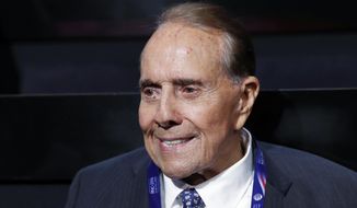 FILE - In this July 18, 2016 file photo, political icon and 1996 Republican presidential nominee Sen. Bob Dole is seen at the Republican National Convention in Cleveland.  Dole says he has been diagnosed with stage 4 lung cancer. The 97-year-old former U.S. Senate majority leader said Thursday in a short statement that he would begin treatment for the disease Monday.  (AP Photo/Carolyn Kaster)