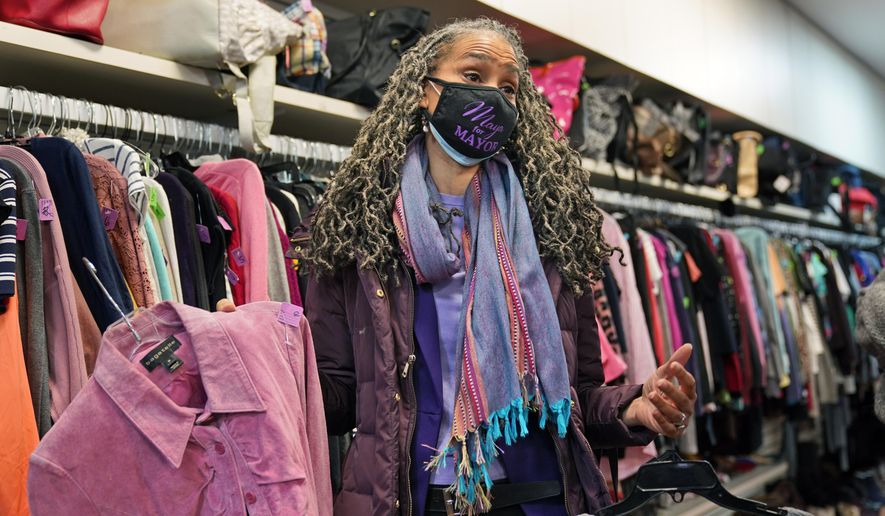New York City mayoral candidate Maya Wiley shops in a thrift store before getting a tour of the Little Sisters of the Assumption Family Health Service in New York, Friday, Feb. 12, 2021. Wiley joins a crowded Democratic primary field that includes longtime elected officials and veterans of the administration of Mayor Bill de Blasio, who is barred by the city charter from seeking a third term. The Democratic mayoral primary is scheduled for June 22. (AP Photo/Seth Wenig)