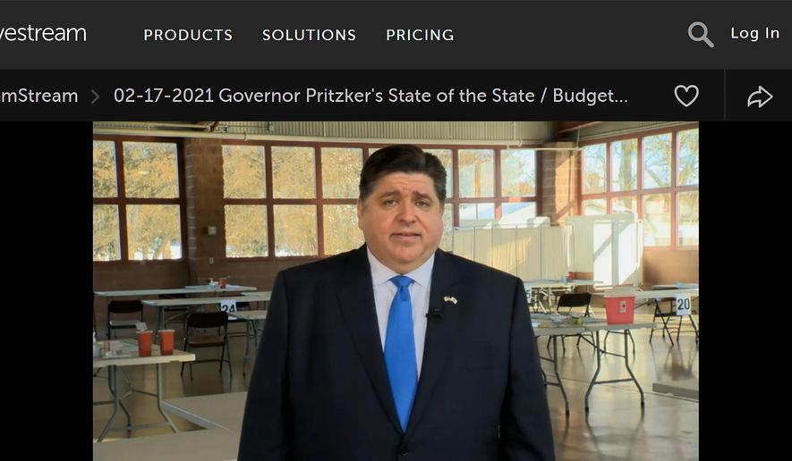 In this still image taken from video, Illinois Gov. J.B. Pritzker presents a remote version of his annual State of the State and budget addresses from a pavilion at the Illinois State Fairgrounds Wednesday, Feb. 17, 2021, in Springfield, Ill. Pritzker steeped in and often guided by Illinois history, chose the location to recall that it was an overflow field hospital in 1918 for victims of the Spanish Flu pandemic, and which, starting Wednesday, became one of the state's largest COVID-19 vaccination sites. (Advanced Digital Media via AP)