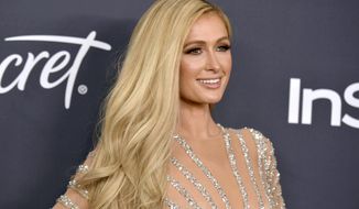 FILE - Paris Hilton arrives at the InStyle and Warner Bros. Golden Globes afterparty on Jan. 5, 2020, in Beverly Hills, Calif. Hilton announced her engagement to entrepreneur Carter Reum in her social media post on Wednesday, Feb. 17, 2021, the same day as her birthday. (Richard Shotwell/Invision/AP, File)
