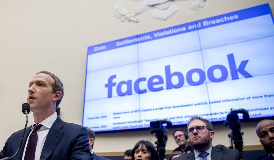 In this Oct. 23, 2019, file photo, Facebook CEO Mark Zuckerberg testifies before a House Financial Services Committee hearing on Capitol Hill in Washington. (AP Photo/Andrew Harnik, File)