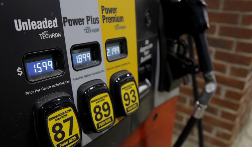 Prices are seen on a gas pump, Tuesday, March 31, 2020, in Brandon, Miss. Earlier in the week, U.S. gasoline prices had dropped to their lowest levels in four years, and they are almost sure to go lower as oil prices plunge. (AP Photo/Julio Cortez)