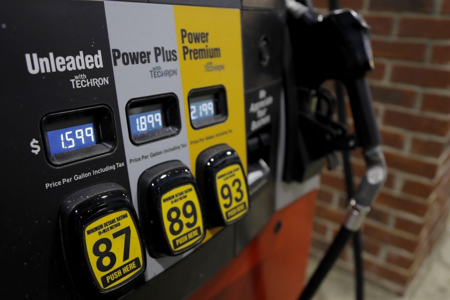 Prices are seen on a gas pump, Tuesday, March 31, 2020, in Brandon, Miss. Earlier in the week, U.S. gasoline prices had dropped to their lowest levels in four years, and they are almost sure to go lower as oil prices plunge. (AP Photo/Julio Cortez)