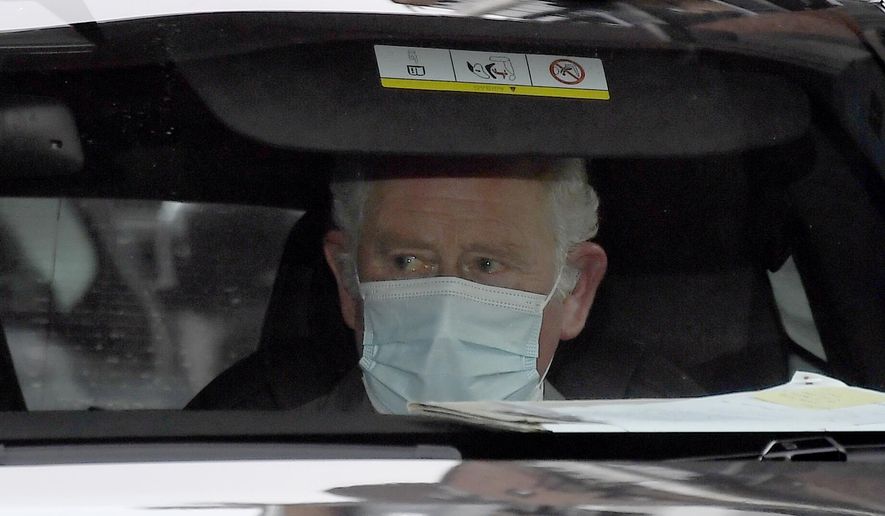 Britain&#39;s Prince Charles leaves the King Edward VII&#39;s hospital by car in London, Saturday Feb.20, 2021, following a visit to see his father Prince Philip. Buckingham Palace said the husband of Queen Elizabeth II, 99-year-old Prince Philip was admitted to the private King Edward VII Hospital on Tuesday evening after feeling unwell.(AP Photo/Alberto Pezzali)