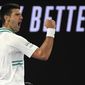 Serbia&#39;s Novak Djokovic reacts after winning a point against Russia&#39;s Daniil Medvedev in the men&#39;s singles final at the Australian Open tennis championship in Melbourne, Australia, Sunday, Feb. 21, 2021.(AP Photo/Andy Brownbill)