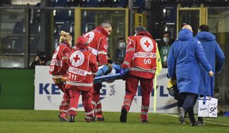 Napoli&#39;s Victor Osimhen is carried away on a stretcher during a Serie A soccer match between Atalanta and Napoli, in Bergamo&#39;s Atleti Azzurri d&#39;Italia stadium, Italy, Sunday, Feb. 21, 2021. (Gianluca Checchi/LaPresse via AP)