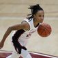 Stanford guard Kiana Williams dribbles against Arizona during the first half of an NCAA college basketball game in Stanford, Calif., Monday, Feb. 22, 2021. (AP Photo/Jeff Chiu)