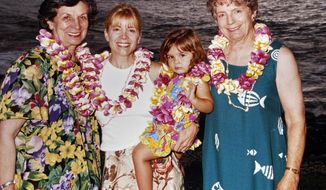 In this September 1999 photo provided by Sophia Eppolito, she poses for a photo while on vacation with from left, Julie Eppolito, Cindy Eppolito and Louise Delfino on the coast of Maui, Hawaii during a family vacation. In a wrenching coincidence that seemed made for 2020, journalist Sophia Eppolito lost both her grandmothers in four months last year. (Jim Eppolito via AP)