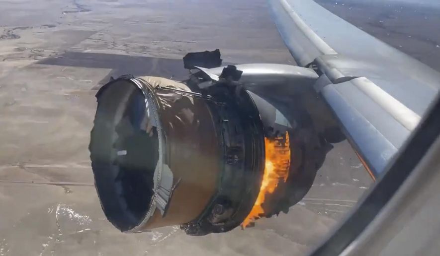 In this image taken from video, the engine of United Airlines Flight 328 is on fire after after experiencing &amp;quot;a right-engine failure&amp;quot; shortly after takeoff from Denver International Airport, Saturday, Feb. 20, 2021, in Denver, Colo. The Boeing 777 landed safely and none of the passengers or crew onboard were hurt. (Chad Schnell via AP)