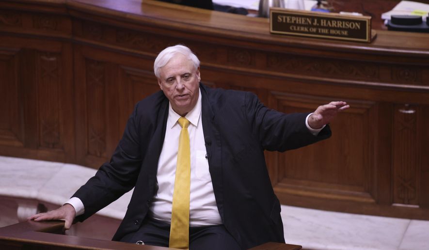 West Virginia Governor Jim Justice speaks during the State of the State Address in the House Chambers of the West Virginia State Capitol Building in Charleston, W.Va., on Wednesday, Feb. 10, 2021. (AP Photo/Chris Jackson)