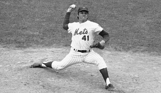 FILE - New York Mets Tom Seaver throws against the Pittsburgh Pirates, enroute to setting a Major League record of eight consecutive seasons of 200 or more strikeouts, at New York&#x27;s Shea Stadium, in this Sept. 1, 1975, file photo. (AP Photo/Harry Harris, File)