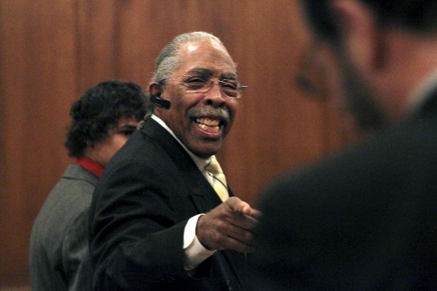 Kenneth Johnson says hello to councilman Anthony Brancatelli as Johnson enters the Cleveland Council Chambers to be sworn in as Ward 4 Councilman on Monday, Jan. 7, 2013, in Cleveland. Johnson, a longtime Cleveland City Council member, was arrested Tuesday, Feb. 23, 2021, in connection with a criminal indictment accusing him of stealing tens of thousands of dollars from the city and a federal program. (Lynn Ischay/The Plain Dealer via AP)