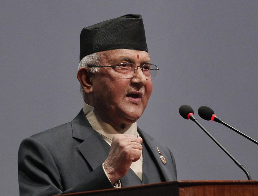 FILE- In this Oct. 11, 2015 file photo, Nepal&#x27;s Khadga Prasad Oli addresses parliament before being appointed as the new Prime Minister in Kathmandu, Nepal. Nepal’s supreme court on Tuesday, Feb. 23, 2021, ordered reinstating parliament that was dissolved by Prime Minister Oli that is likely to push the Himalayan nation to a political crisis. (AP Photo/Niranjan Shrestha, File)