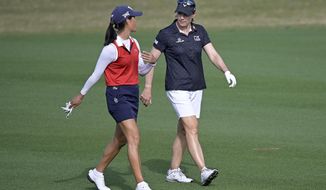 FILE - In this Sunday, Jan. 24, 2021 file photo, Celine Boutier, left, of France, and Annika Sorenstam, of Sweden, chat while walking down the 17th fairway during the final round of the Tournament of Champions LPGA golf tournament in Lake Buena Vista, Fla. Sorenstam will compete on the LPGA this week for the first time since 2008. (AP Photo/Phelan M. Ebenhack, File)