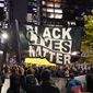 In this Nov. 4, 2020, photo, protesters representing Black Lives Matter and Protect the Results march in Seattle. A financial snapshot shared exclusively with The Associated Press shows the Black Lives Matter Global Network Foundation raked in just over $90 million last year. (AP Photo/Ted S. Warren) **FILE**