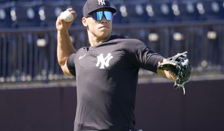 New York Yankees&#39; Aaron Judge takes part in a drill during a spring training baseball workout Tuesday, Feb. 23, 2021, in Tampa, Fla. (AP Photo/Frank Franklin II)