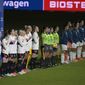 Players from the United States, left, and Argentina teams stand during the national anthems before a SheBelieves Cup women&#39;s soccer match, Wednesday, Feb. 24, 2021, in Orlando, Fla. (AP Photo/Phelan M. Ebenhack)
