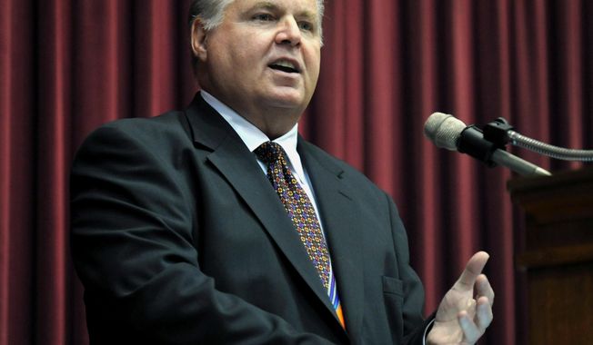FILE - In this May 14, 2012 file photo, Rush Limbaugh speaks during a ceremony inducting him into the Hall of Famous Missourians in the state Capitol in Jefferson City, Mo. Florida Gov. Ron DeSantis is moving ahead with plans to honor the recently deceased conservative radio broadcaster by lowering flags to half-staff despite protests from some public officials who don’t see Limbaugh as worthy of the honor. (AP Photo/Julie Smith, File)