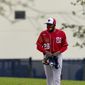 Washington Nationals pitcher Jeremy Jeffress walks out for spring training baseball practice Thursday, Feb. 25, 2021, in West Palm Beach, Fla. (AP Photo/Jeff Roberson) **FILE**